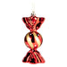 Glossy red wrapped-sweet tree decoration with gold stripes and white dots on a gold string