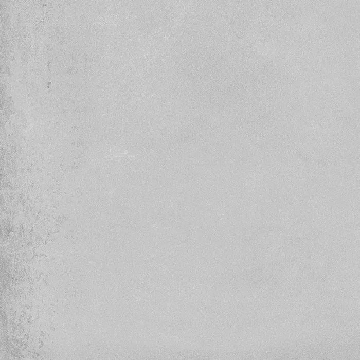 Close-up of Adine Gris tile showing its fine matt surface and soft grey colour.