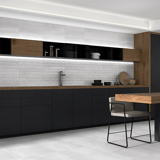 A feature wall with Barrington Concept White tiles, showing a modern textured effect.