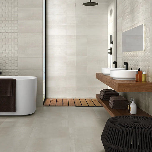 A bathroom floor tiled with Barrington Cream tiles, adding warmth and elegance to the space.