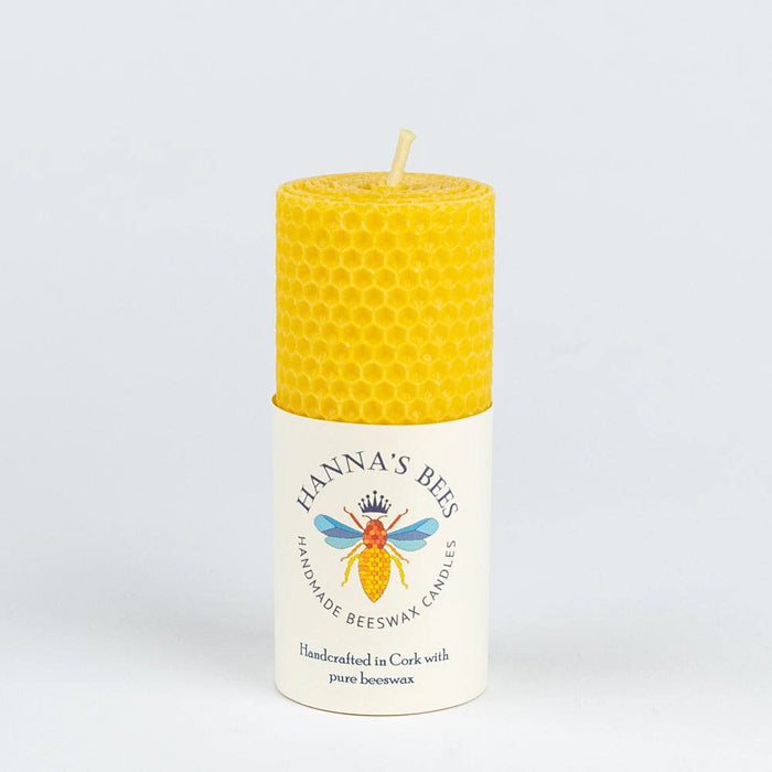 Hanna's Bees medium hand rolled beeswax pillar candle with honeycomb texture