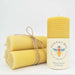 Hanna's Bees medium hand rolled beeswax pillar candle with honeycomb texture