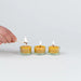 Hanna's Bees beeswax tealight candles gift set with three tealights in glass holders in a small gift box