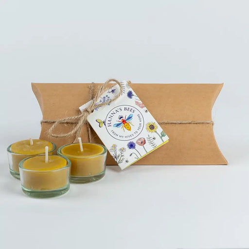 Hanna's Bees beeswax tealight candles gift set with three tealights in glass holders in a small gift box