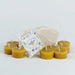 Hanna's Bees beeswax tealight refill pack with eight tealights in a cotton bag