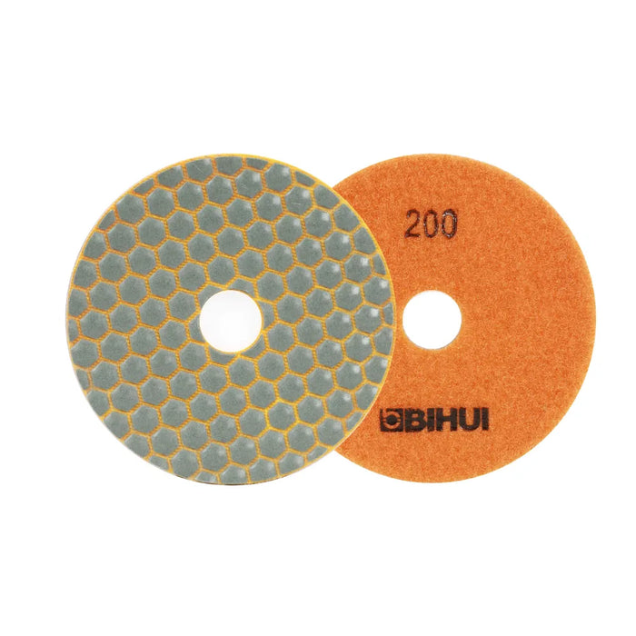 Close-up of the Bihui 4" 200 Grit Dry Diamond Polishing Pad showing its fine-textured surface and light-colored backing for polishing white tiles.
