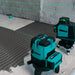 Close-up of the Bihui 12-line self-levelling laser level showing green laser lines and compact, durable housing with bracket mount.