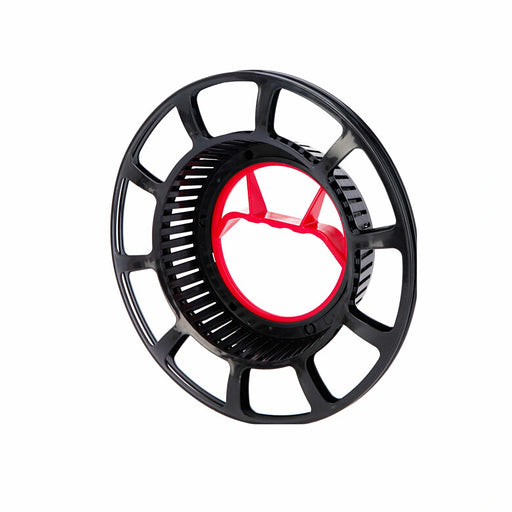 Close-up of black round reel showing coiled Christmas lights.