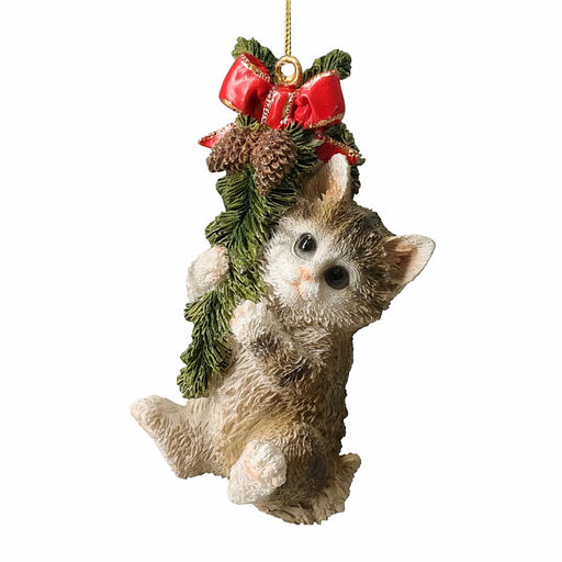 Close-up of Brown Cat Hanging From A Garland showing realistic fur detail and colourful garland design.