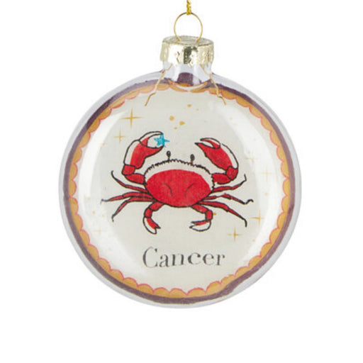 Close-up of Cancer Zodiac Christmas bauble showing zodiac design and reflective finish.