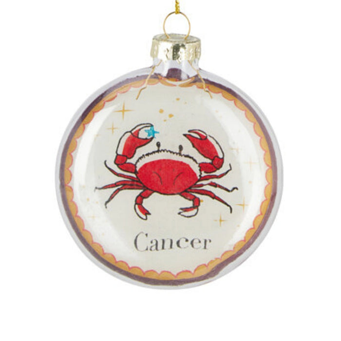 Close-up of Cancer Zodiac Christmas bauble showing zodiac design and reflective finish.