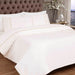 Champagne and biscuit 2 row cord duvet set styled on a bed, showing soft sateen cotton fabric with elegant cord detail.