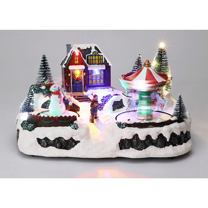 Close-up of Christmas Carousel LED House showing detailed carousel figures and illuminated LED features.