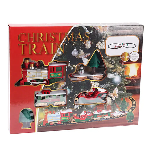 Close-up of Christmas train set showing detailed locomotive engine and brightly coloured carriages.