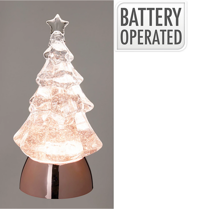 Close-up of Christmas tree showing battery-operated LED lights and detailed green branches