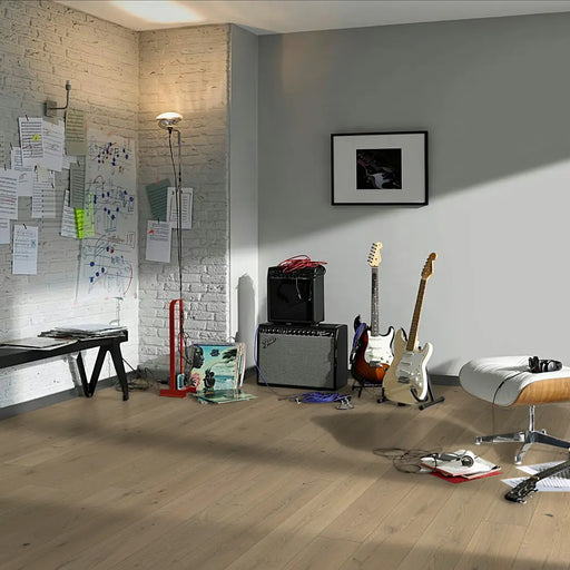 Classic 3060 Soave White flooring in a creative studio space featuring guitars, music sheets, and a sound amplifier, with soft natural lighting enhancing the whitewashed tones.