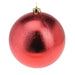 Close-up of dimpled red bauble showing textured glossy finish.