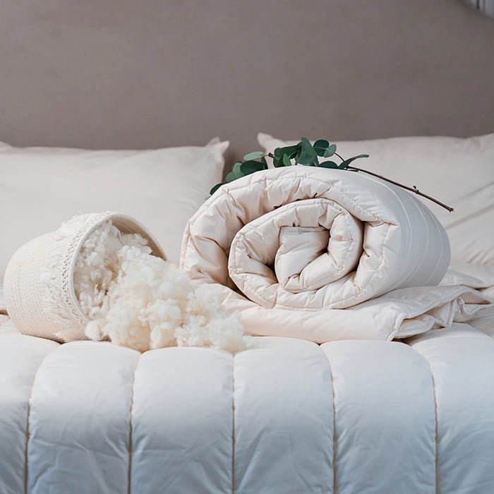 Dooleys Irish Wool All Season Duvet folded on a bed showing natural wool bedding for year round comfort