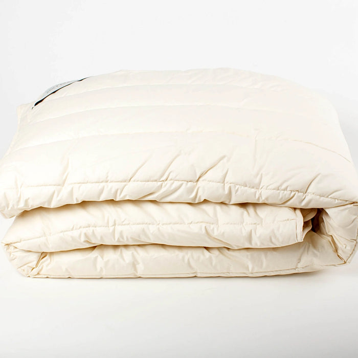 Dooleys Irish Wool Winter Duvet on a bed with cotton cover and natural wool filling for cold nights
