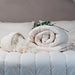 Dooleys Irish Wool Winter Duvet on a bed with cotton cover and natural wool filling for cold nights