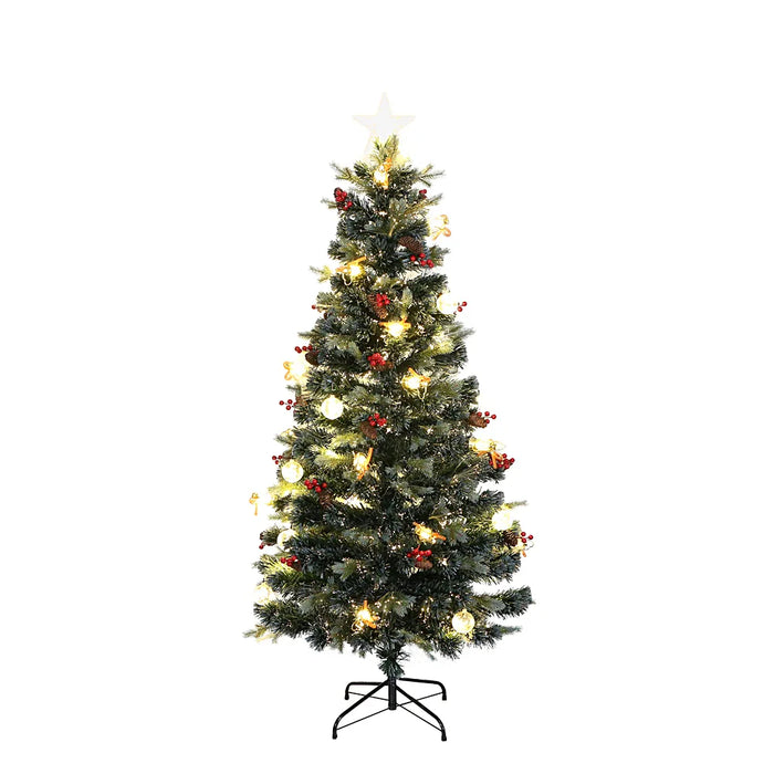 Close-up of green fiber optic Christmas tree showing pinecones, berries, and illuminated lantern detail.