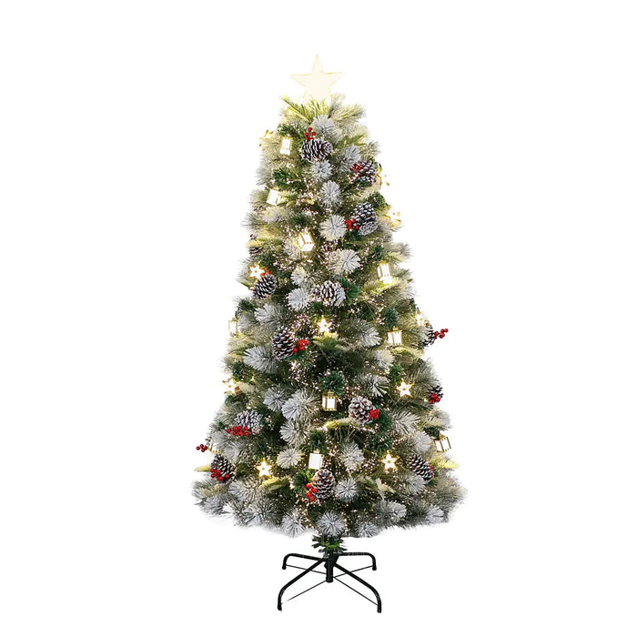 Close-up of snowy tree branches with fiber optic lights, pinecones, and red berry accents.