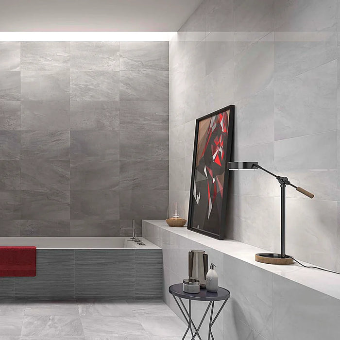 Modern bathroom featuring Fred Perla wall tiles, adding a calm and elegant atmosphere.