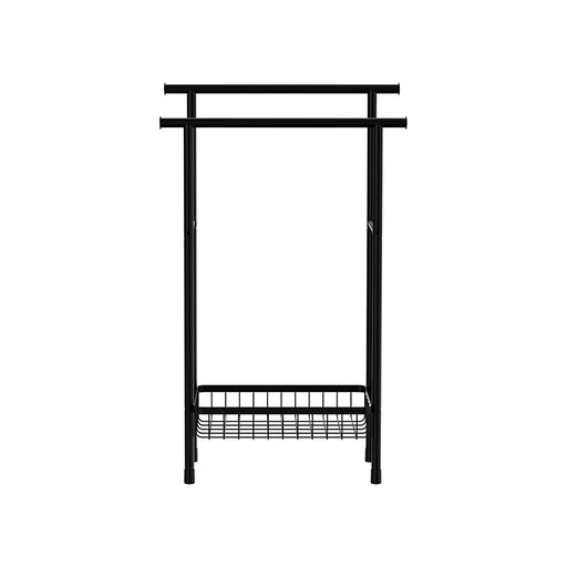 Free standing black towel rail with modern minimalist design in a bathroom