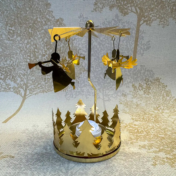 Close-up of gold angel carousel tealight holder showing delicate angel figures in motion.