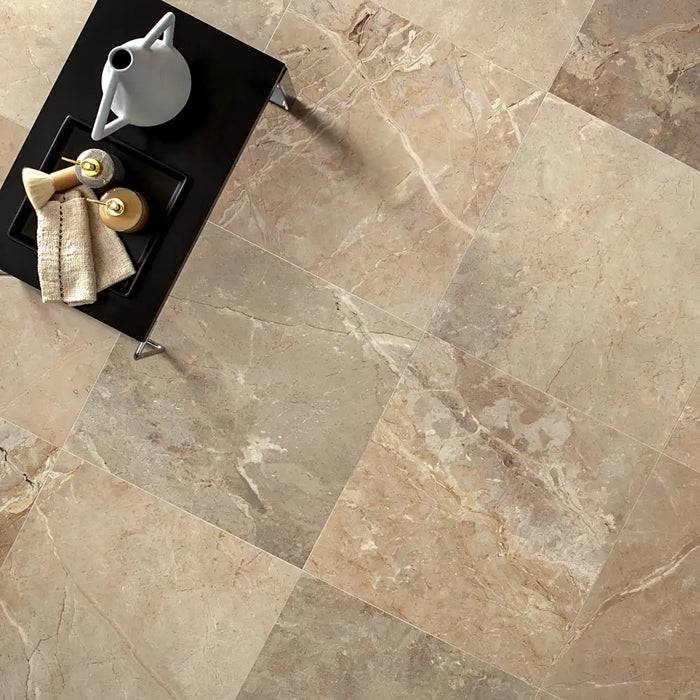 Close-up of Golden Age Beige Porcelain tile, highlighting the intricate marble-inspired veins in golden, beige, and purple hues.