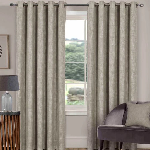 Grey linen-look eyelet curtains with double-faced blackout lining for a clean, tailored look
