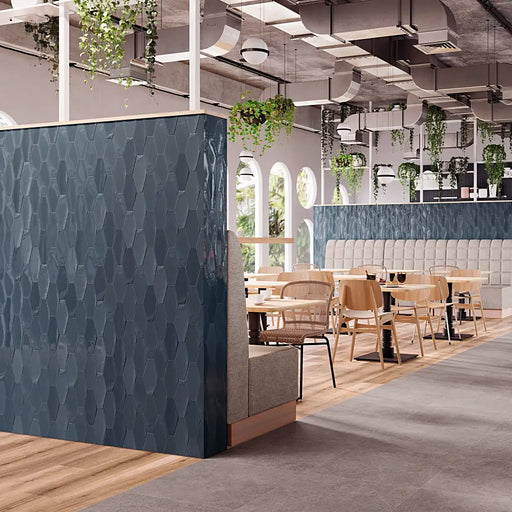 Wall decorated with Harlequin Navy wall tiles in a herringbone pattern, creating a bold and stylish look.