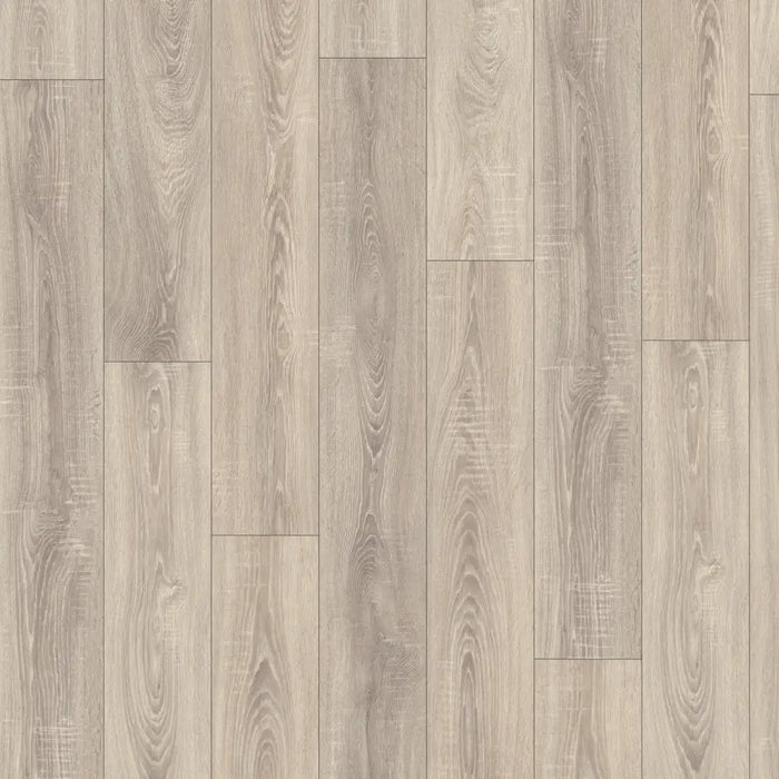 Detailed view of Dawn Oak laminate plank with Deepskin texture, subtle knots, and gentle grain lines in a light grey colour.