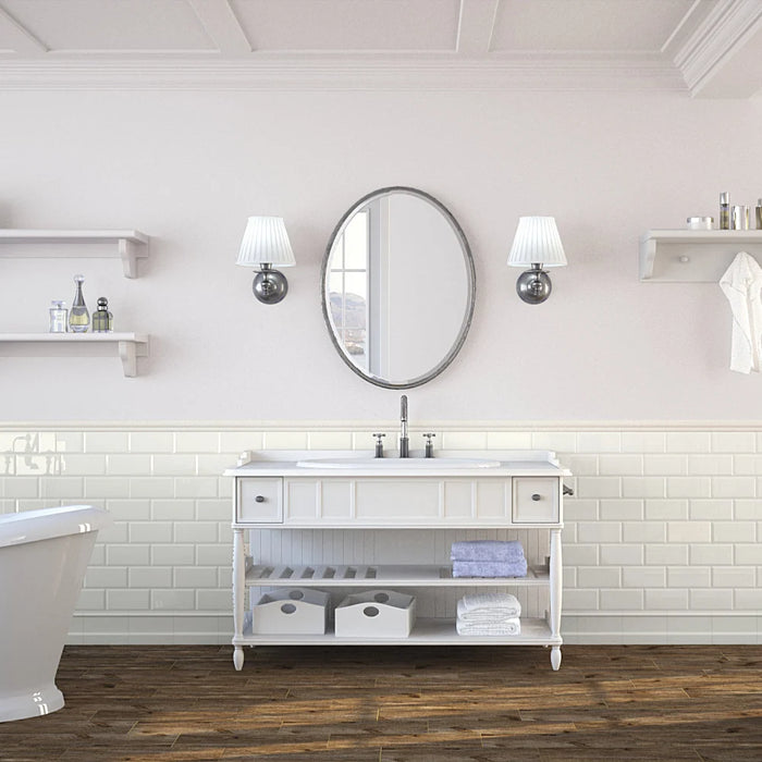 Bathroom splashback tiled with Homeful Essentials Metro Marfil tiles, adding warmth with a glossy ivory tone.