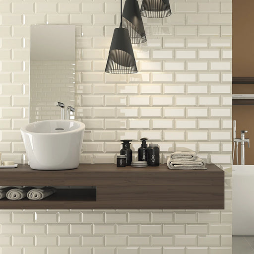 Bathroom splashback tiled with Homeful Essentials Metro Marfil tiles, adding warmth with a glossy ivory tone.