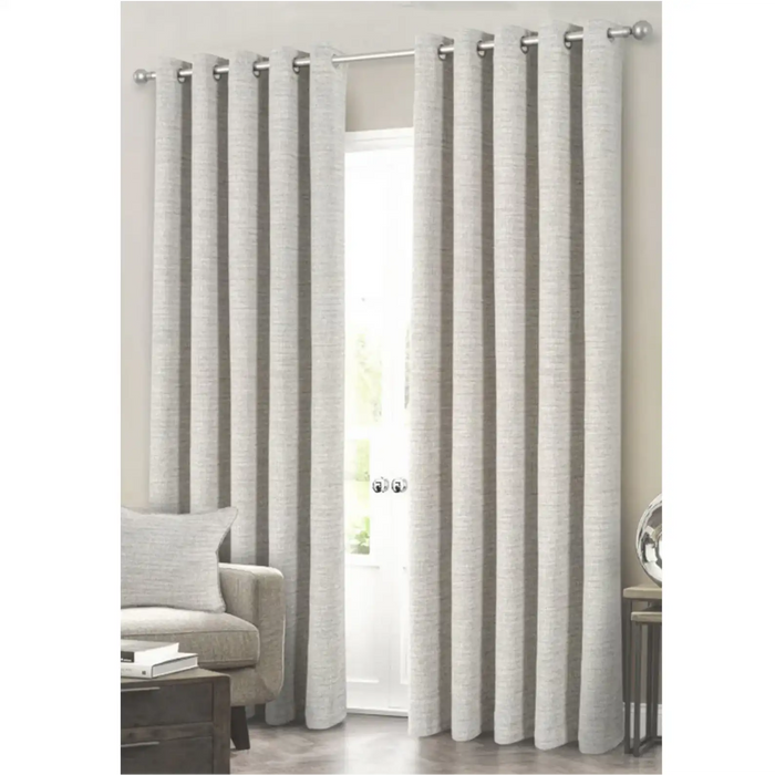 Kendal Flax eyelet curtains with blackout lining in a natural textured fabric