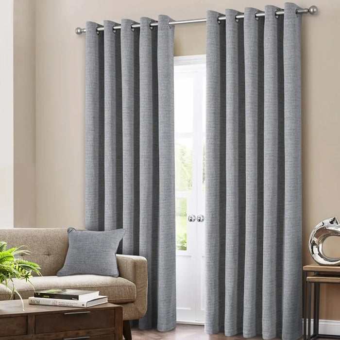Kendal Marine blackout eyelet curtains with a soft weave and rich ocean blue tone