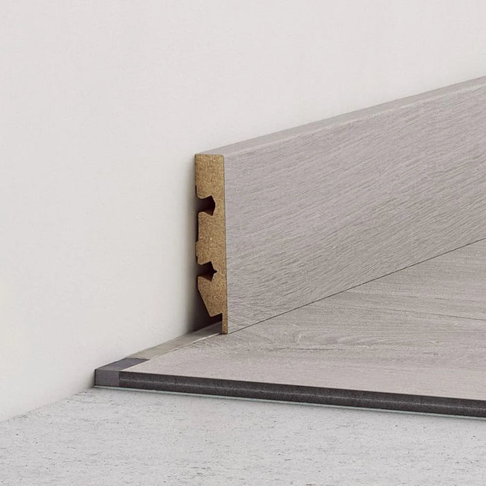 Roll of LVT/SPC expansion joint foam strip, placed beside vinyl flooring.