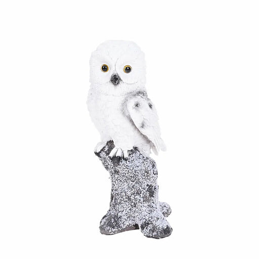 Close-up of Left Hand Owl On Tree Trunk Ornament showing intricate feather and tree trunk details.