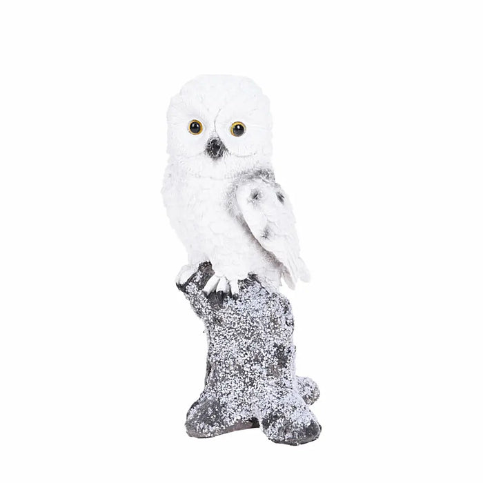 Close-up of Left Hand Owl On Tree Trunk Ornament showing intricate feather and tree trunk details.