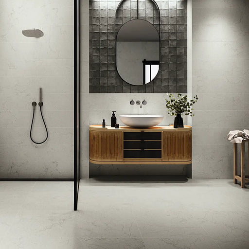 Bathroom splashback in Limestone Grey wall tiles with a clean and modern stone finish.