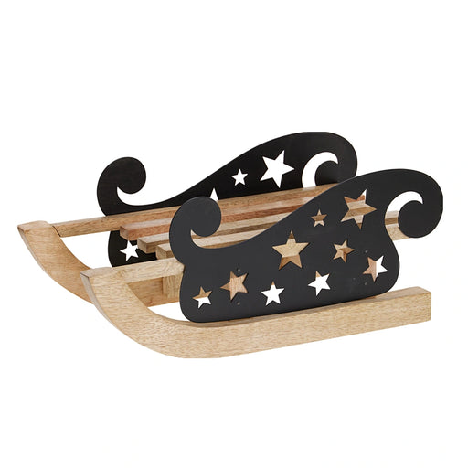 Close-up of mango wood Christmas sledge showing its smooth finish and natural wood texture.