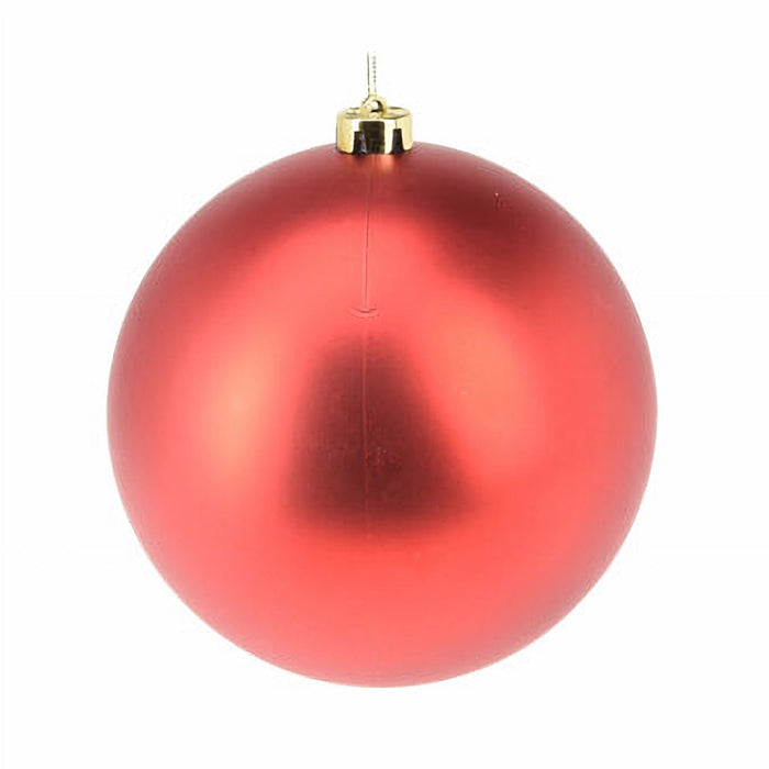 Close-up of matt red bauble showing velvety soft surface.