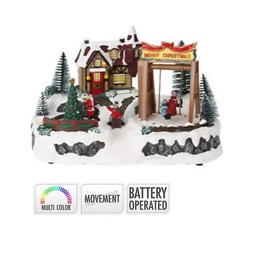 Close-up of Merry Christmas Swing LED House showing detailed swinging figures and illuminated features.