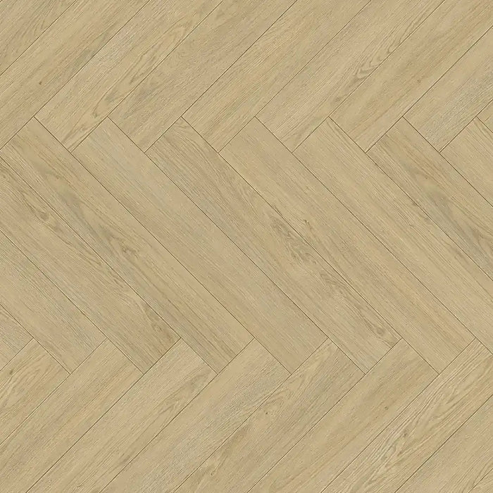 Close-up view of Mont Blanc Sanded Herringbone plank showing its natural oak grain, matt sanded texture, and refined parquet-style edge detail.
