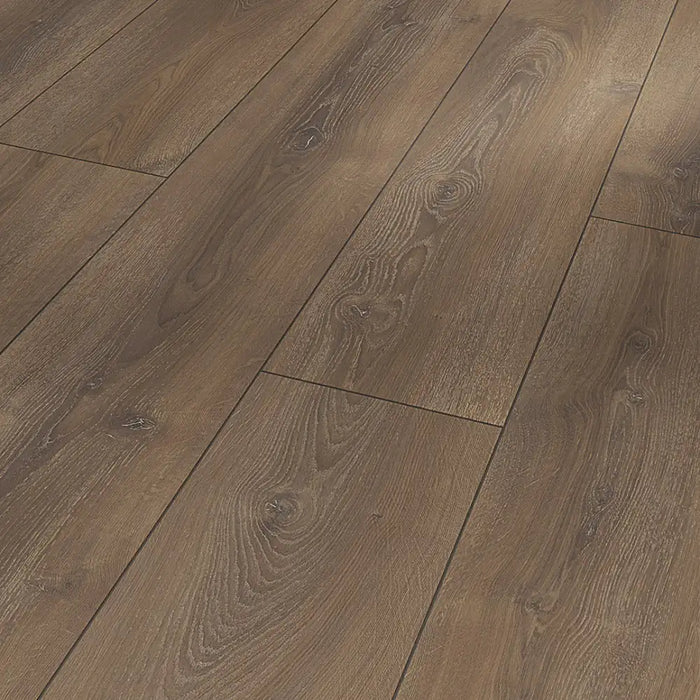 Detailed view of Montana Limed laminate plank, showcasing its authentic wood grain with limed highlights and natural textured finish for a raw, rustic look.