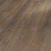 Detailed view of Montana Limed laminate plank, showcasing its authentic wood grain with limed highlights and natural textured finish for a raw, rustic look.