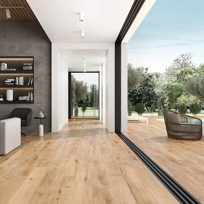 Inside and outside with Naturwood Moka tiles, creating a warm wood-look floor.