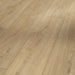 Close-up of Nova Limed laminate plank showing natural wood grain texture, limed oak finish, and precision bevelled edge detailing.