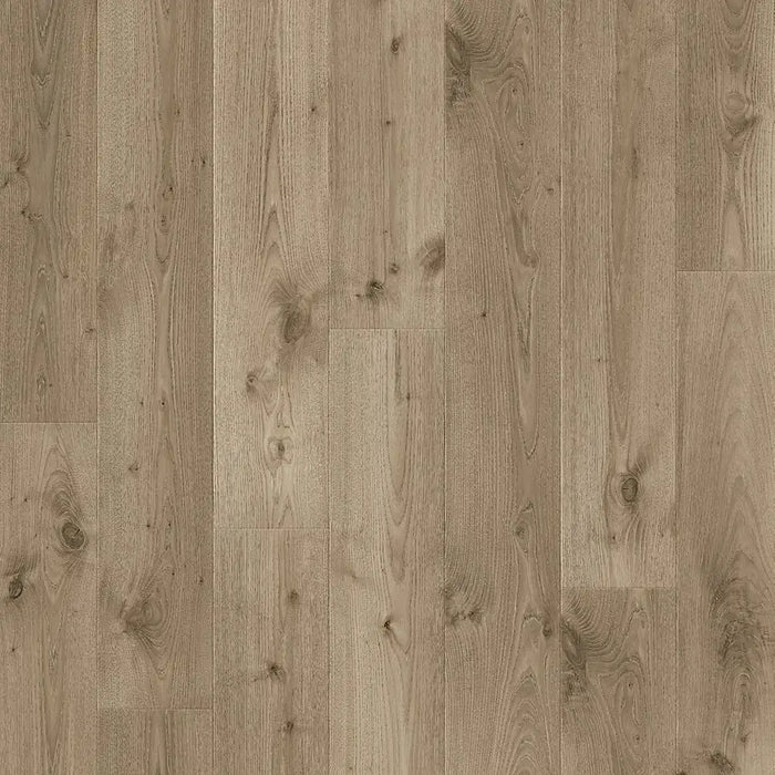 Detailed close-up of Pergo Arendal Meadow showing the soft golden colour, realistic wood grain texture, and matte finish with bevelled edges.